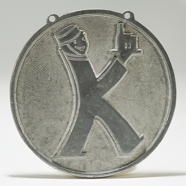 Krueger K-Man Embossed Cast Aluminum Sign