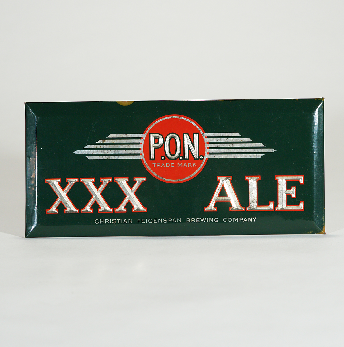 P.O.N. XXX Ale Celluloid over TOC Sign